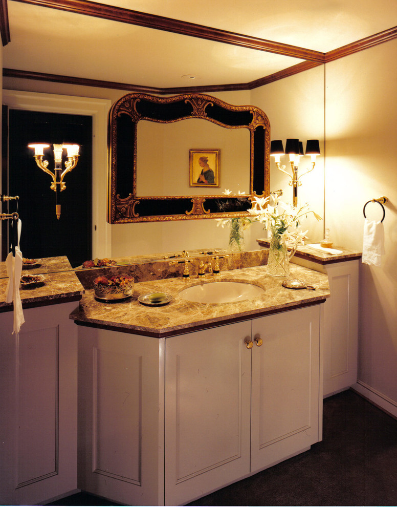 Inspiration for a mid-sized transitional master ceramic tile and brown floor bathroom remodel with shaker cabinets, white cabinets, yellow walls, an undermount sink and granite countertops