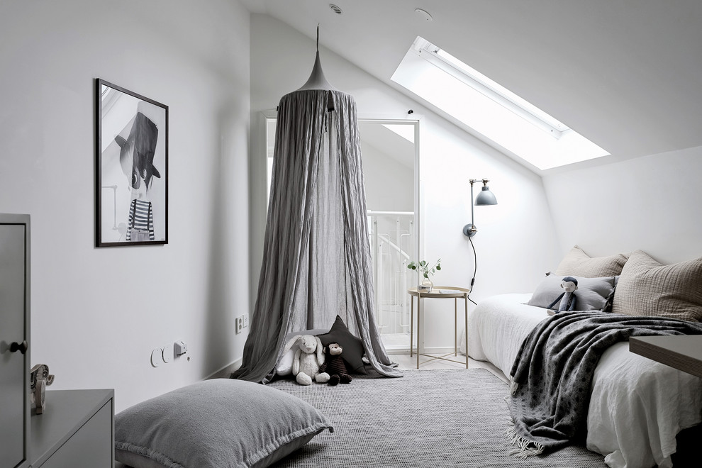 Mid-sized scandinavian master bedroom in Gothenburg with white walls and no fireplace.