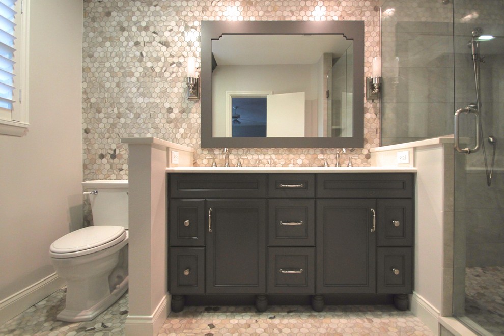 Inspiration for a mid-sized transitional master gray tile and marble tile gray floor and marble floor double shower remodel in Orlando with recessed-panel cabinets, dark wood cabinets, gray walls, an undermount sink, quartzite countertops and a hinged shower door