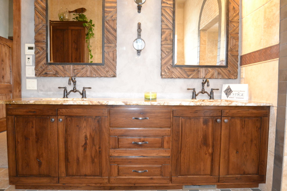 Example of a mid-sized mountain style master bathroom design with medium tone wood cabinets and granite countertops