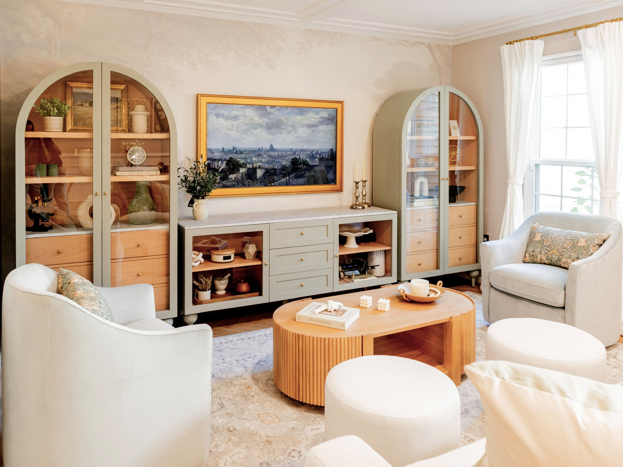 We transformed our clients living room, dining room, entryway and staircase into an Art Deco Paradise - where vintage meets modern. This project was a lot of fun for us to tune into a different style