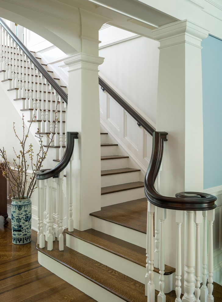 Design ideas for a mid-sized traditional wood l-shaped staircase in Boston with painted wood risers.