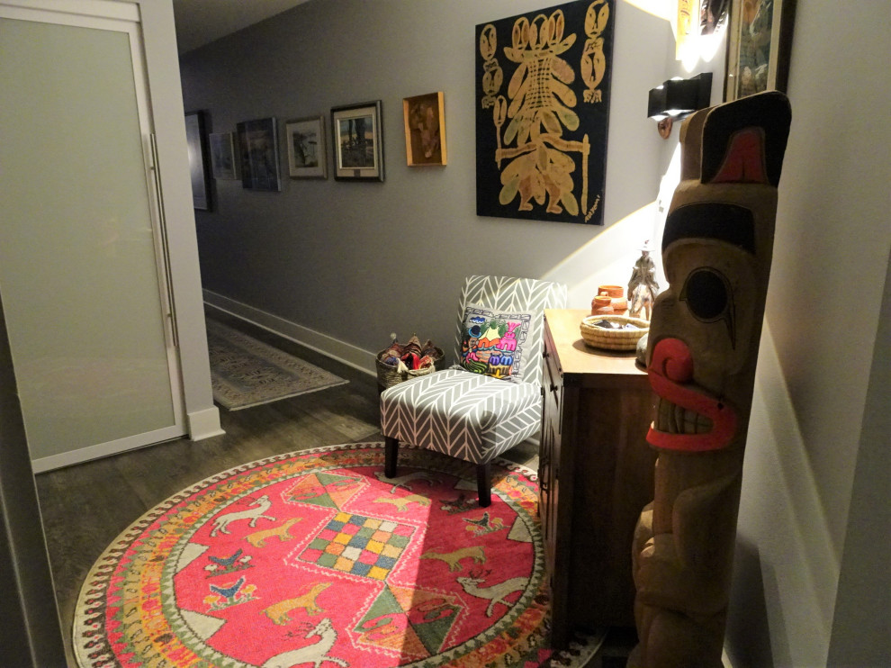 Design ideas for a bohemian foyer in Vancouver with grey walls, vinyl flooring, a single front door and grey floors.
