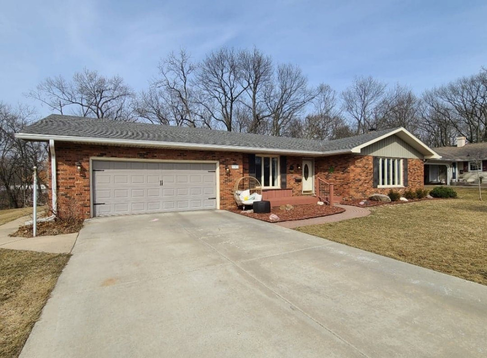 Siding, roof, shutter colors on orange brick house