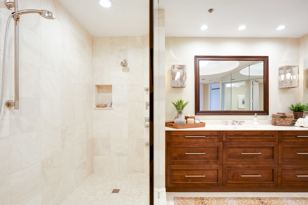 This is an example of a large transitional master bathroom in Tampa with an undermount sink, raised-panel cabinets, medium wood cabinets, an open shower, a one-piece toilet, beige walls and travertine floors.