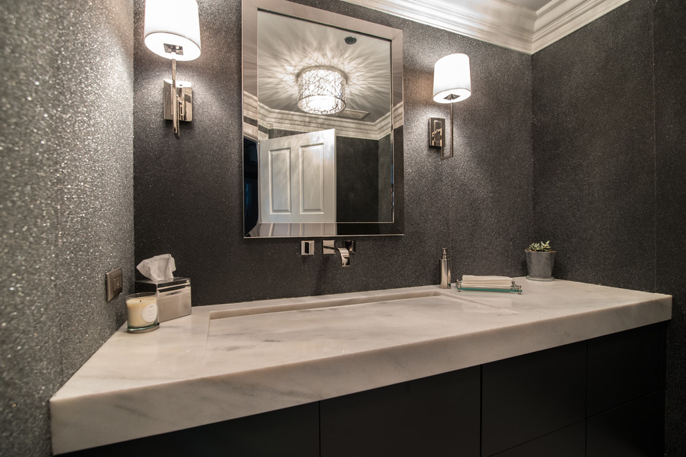 This is an example of a mid-sized contemporary master bathroom in Chicago with grey walls, flat-panel cabinets, dark wood cabinets, a trough sink and marble benchtops.