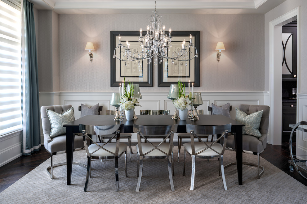 Inspiration for a traditional separate dining room in Toronto with grey walls and dark hardwood floors.