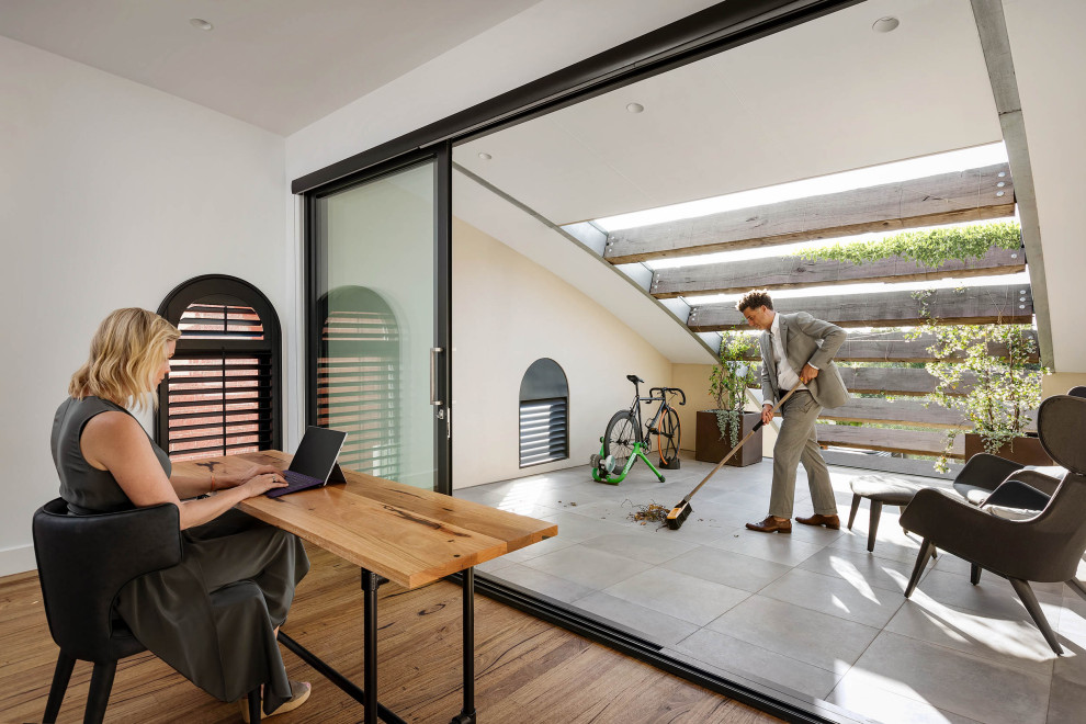 Photo of a contemporary study room in Melbourne with a freestanding desk.