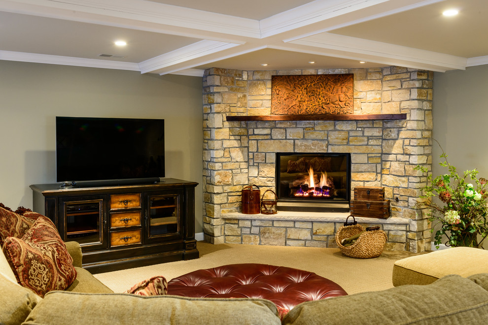 Design ideas for a mid-sized country fully buried basement in Chicago with a corner fireplace and a stone fireplace surround.