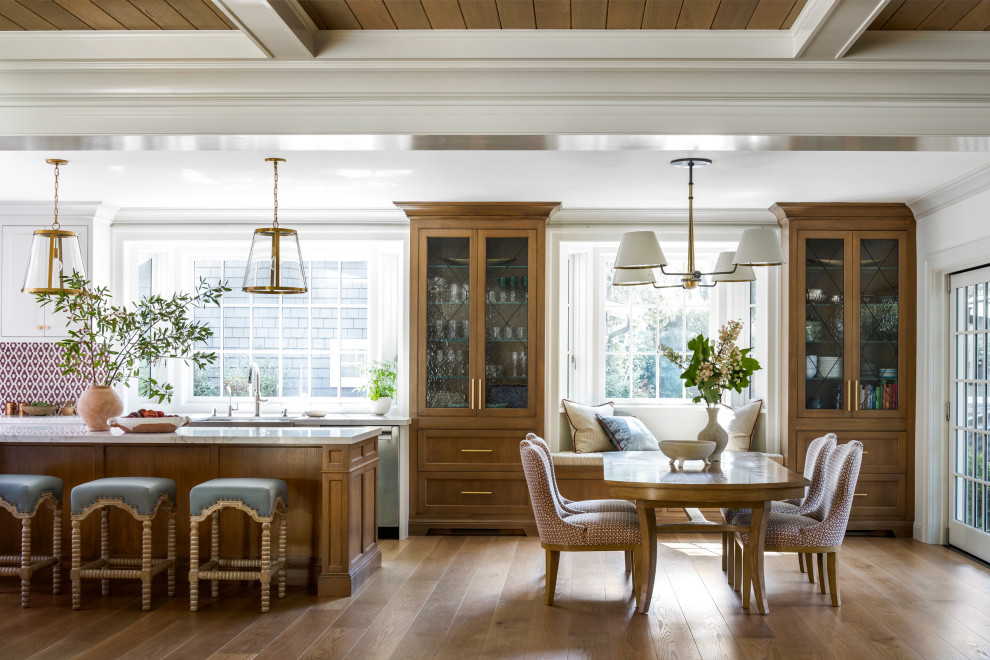 Inspiration for a timeless medium tone wood floor and coffered ceiling great room remodel in San Francisco with white walls