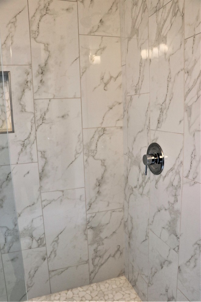 Photo of a contemporary bathroom in Austin with shaker cabinets, grey cabinets, a curbless shower, multi-coloured tile, marble, grey walls, marble floors, a vessel sink, engineered quartz benchtops, multi-coloured floor and a hinged shower door.
