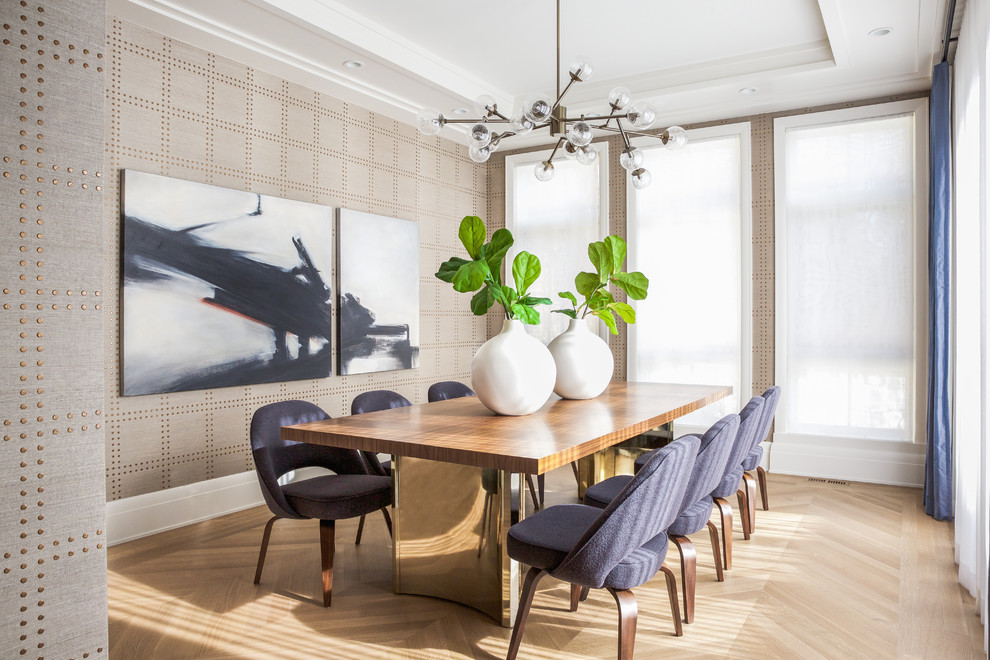 Inspiration for a mid-sized transitional separate dining room in Calgary with beige walls, light hardwood floors, no fireplace and beige floor.