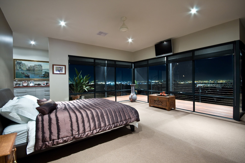 Inspiration for a large traditional master bedroom in Perth with beige walls, carpet and beige floor.