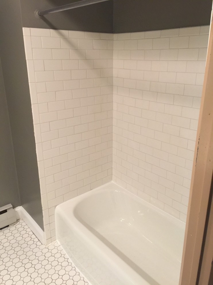 This is an example of a mid-sized modern 3/4 bathroom in Other with an alcove tub and a shower/bathtub combo.