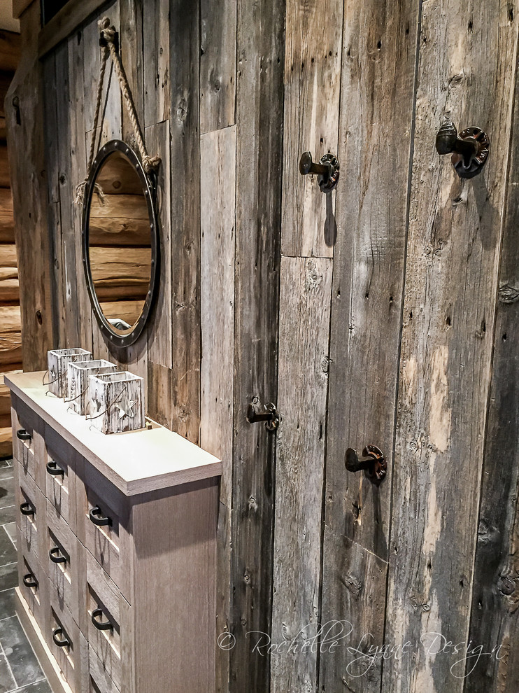 Hallway - mid-sized rustic slate floor hallway idea in Calgary