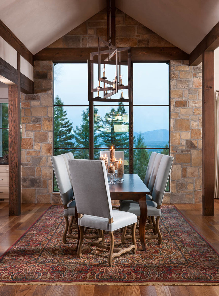 This is an example of a country dining room in Other with medium hardwood floors.