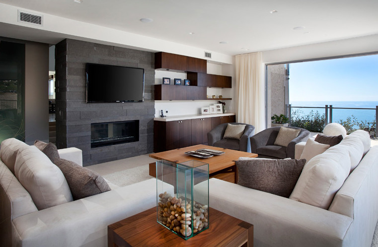 This is an example of a contemporary family room in Orange County.