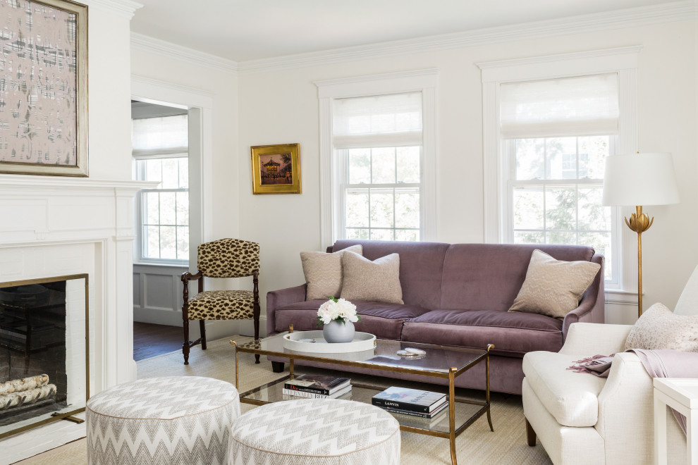 This is an example of a transitional living room in Boston with white walls, a standard fireplace, a brick fireplace surround, no tv and beige floor.