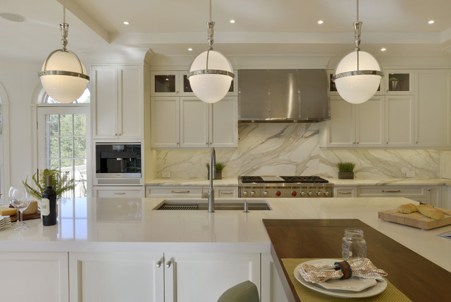 A Dramatic Marble Backsplash in a Transitional Kitchen nyklassisk-koekken