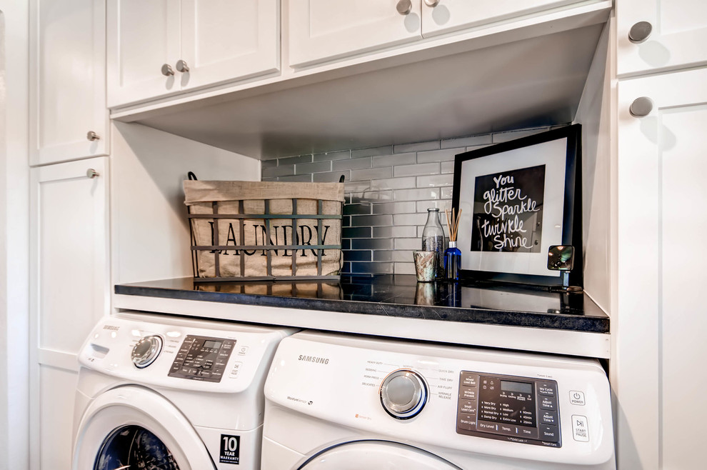Inspiration for a small transitional galley dedicated laundry room in Denver with shaker cabinets, white cabinets, soapstone benchtops, white walls, ceramic floors and a side-by-side washer and dryer.
