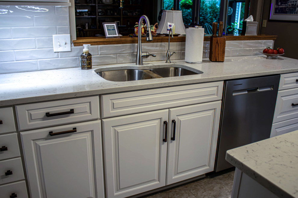 White Kitchen with Carrara Grigio Quartz Countertops and Subway Tile ...