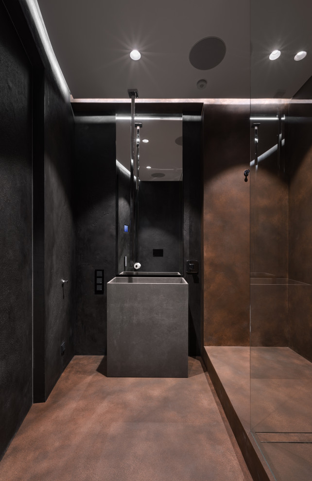 This is an example of a medium sized urban shower room bathroom in Los Angeles with flat-panel cabinets, black cabinets, orange tiles, metal tiles, black walls, porcelain flooring, a pedestal sink, orange floors, feature lighting, a single sink, a freestanding vanity unit, a drop ceiling and wainscoting.