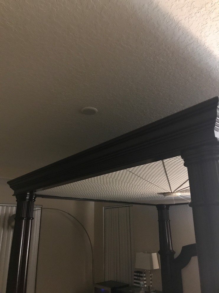 Light fixture over canopy bed