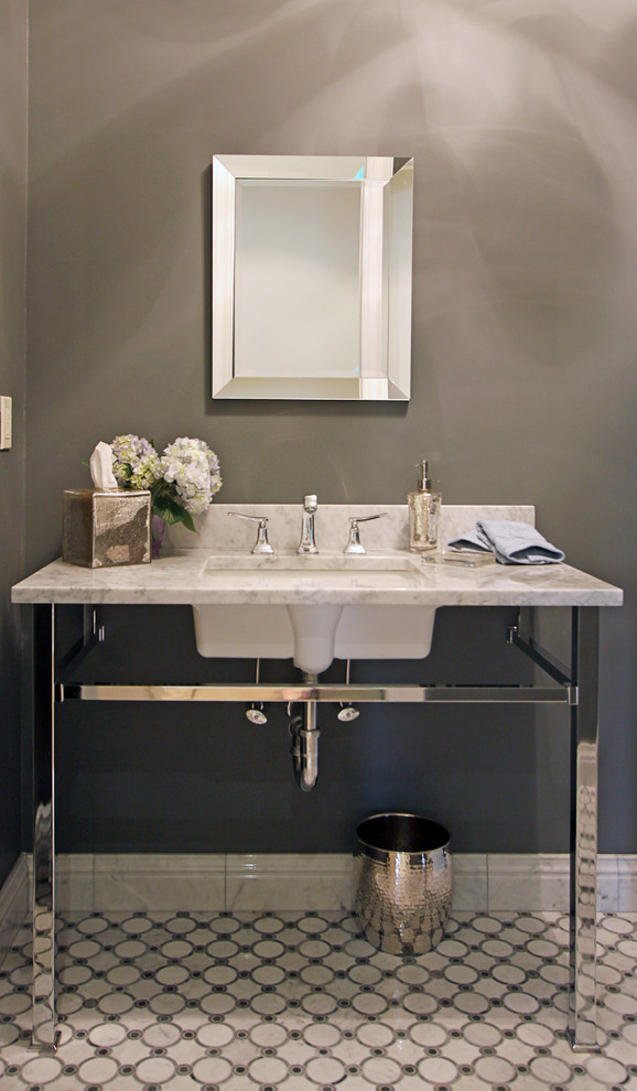 Photo of a transitional powder room in New York.