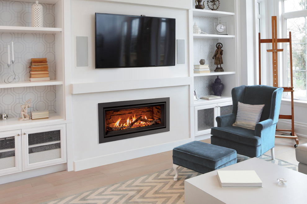 Inspiration for a modern living room in Vancouver with white walls and a wall-mounted tv.