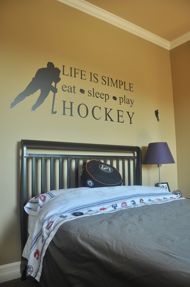 Inspiration for a mid-sized transitional kids' bedroom for kids 4-10 years old and boys in Vancouver with yellow walls.