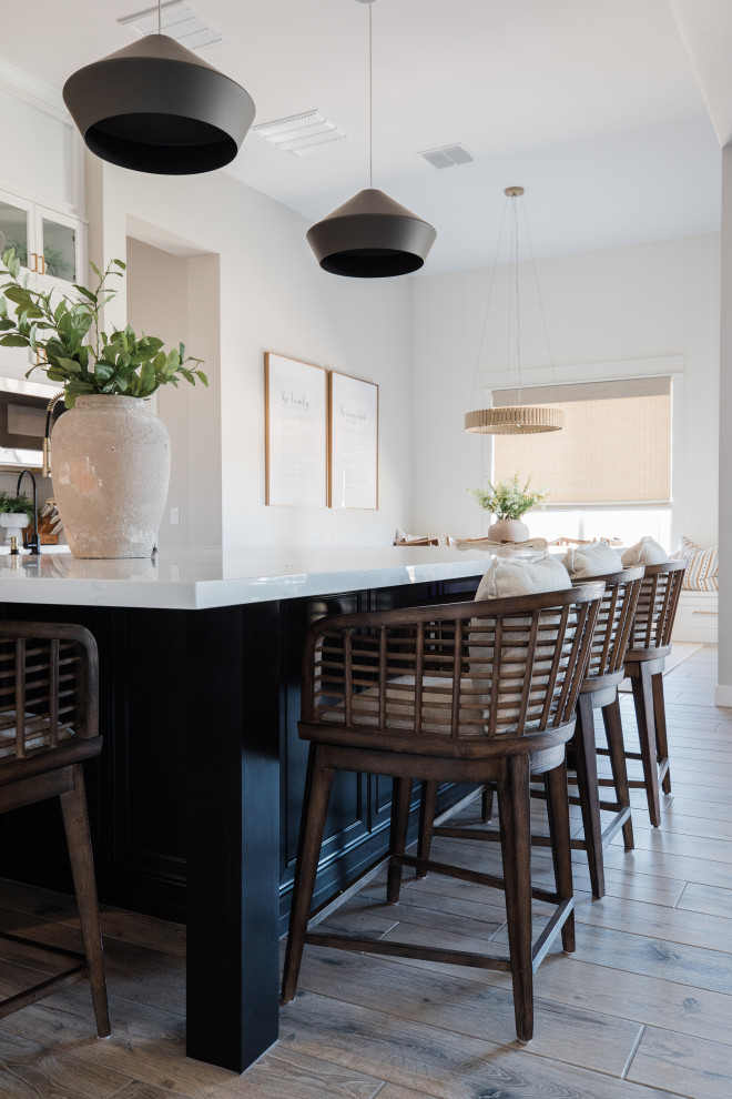 Example of a transitional home bar design in Phoenix