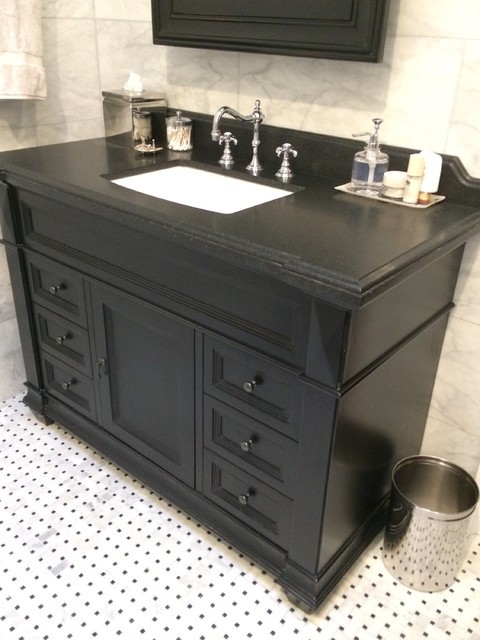 Photo of a mid-sized traditional bathroom in Bridgeport with furniture-like cabinets, black cabinets, beige tile, black and white tile, stone tile, beige walls, a wall-mount sink and granite benchtops.
