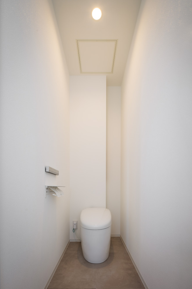 他の地域にあるおしゃれなトイレ・洗面所の写真