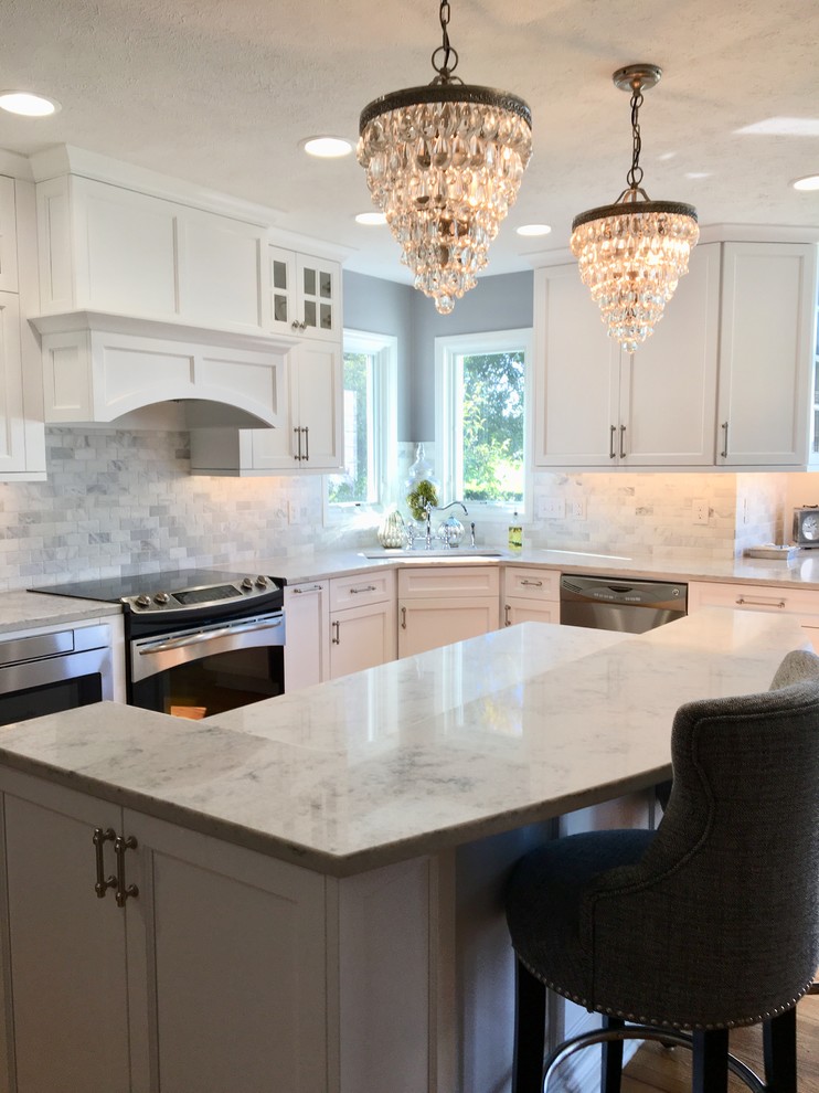 Example of a transitional kitchen design in Omaha