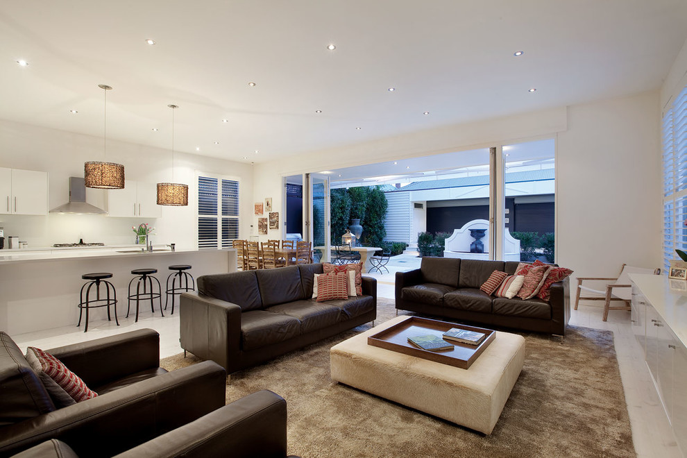 Photo of a contemporary open concept living room in Melbourne.