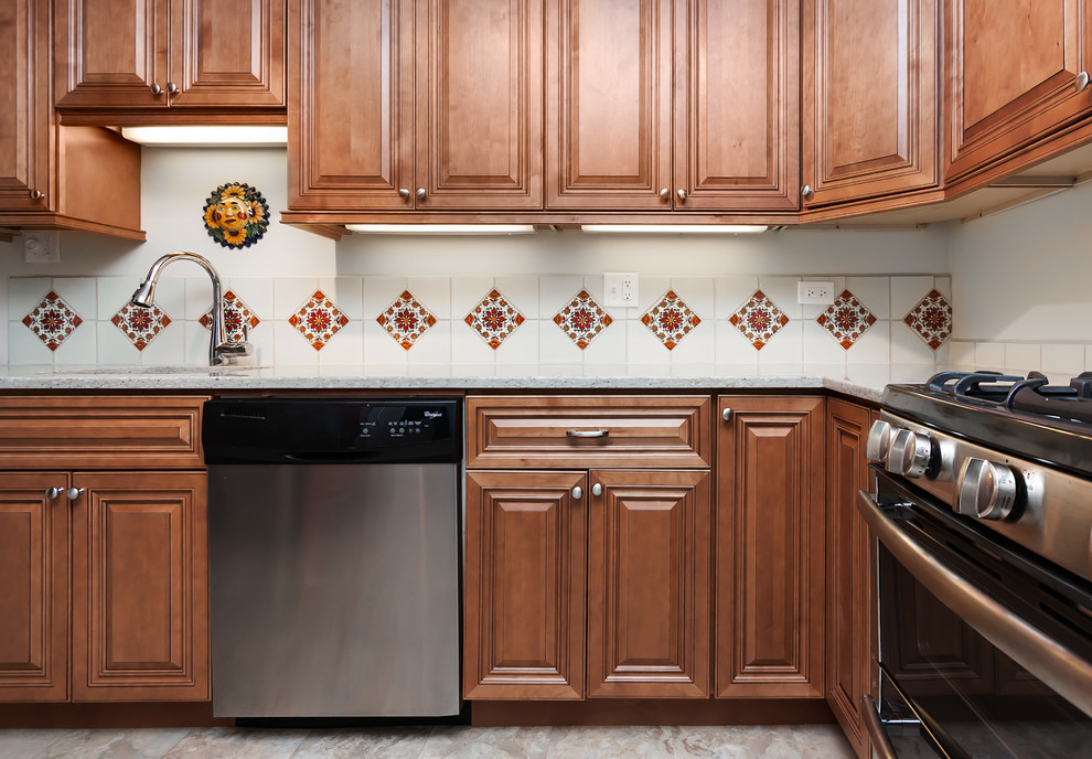 Mid-sized traditional l-shaped separate kitchen in Chicago with a single-bowl sink, raised-panel cabinets, medium wood cabinets, quartzite benchtops, white splashback, ceramic splashback, stainless steel appliances and no island.