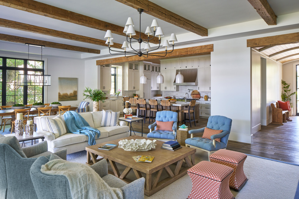 Inspiration for a large coastal formal and open concept dark wood floor, brown floor, exposed beam and shiplap wall living room remodel in DC Metro with white walls