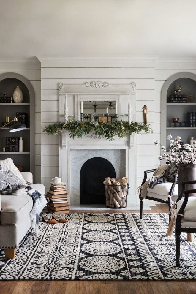 Inspiration for a mid-sized traditional formal open concept living room in San Luis Obispo with white walls, medium hardwood floors and a standard fireplace.
