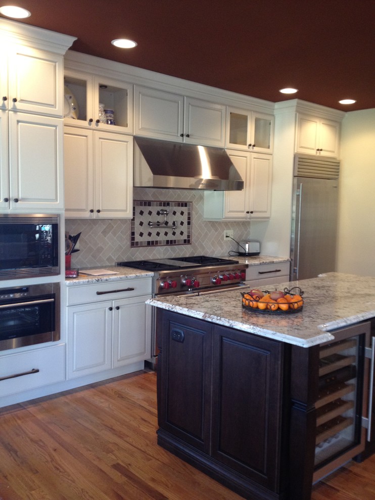 Inspiration for a transitional kitchen remodel in DC Metro with an island
