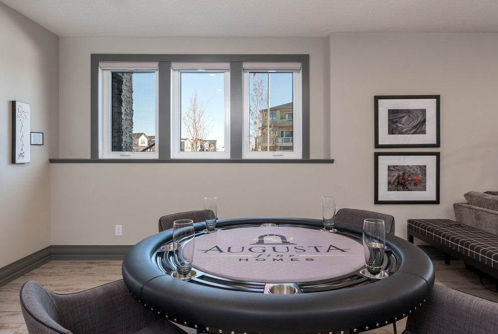 Example of a transitional home design design in Calgary
