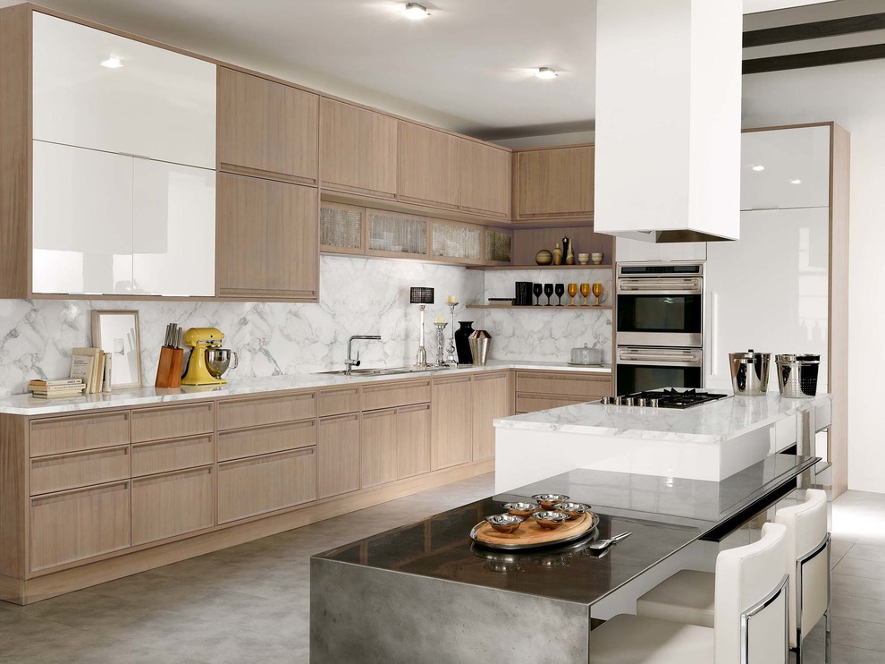 Transitional l-shaped open concept kitchen photo with flat-panel cabinets and an island