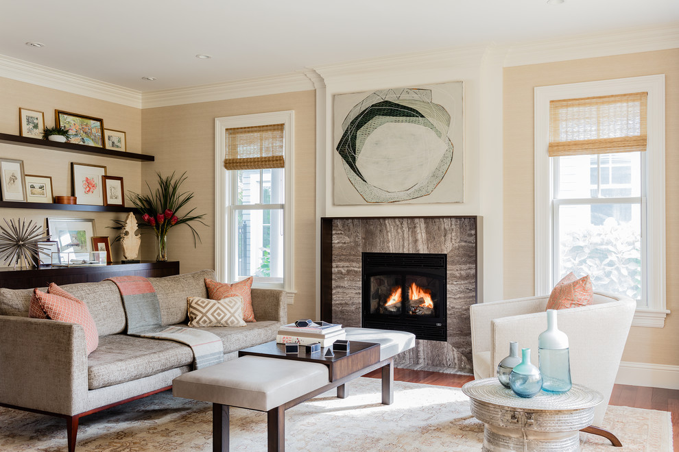 Inspiration for a large traditional formal living room in Boston with beige walls, a standard fireplace, medium hardwood floors and a stone fireplace surround.