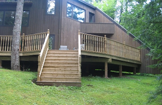 Backyard balcony deck photo with no cover