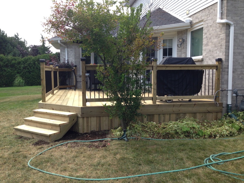 Deck - rustic deck idea in Toronto