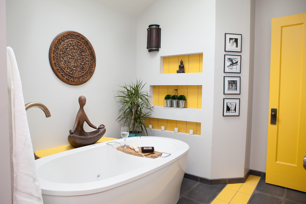 Mid-sized asian master bathroom in Chicago with medium wood cabinets, a freestanding tub, an alcove shower, a two-piece toilet, gray tile, white walls, a vessel sink and wood benchtops.