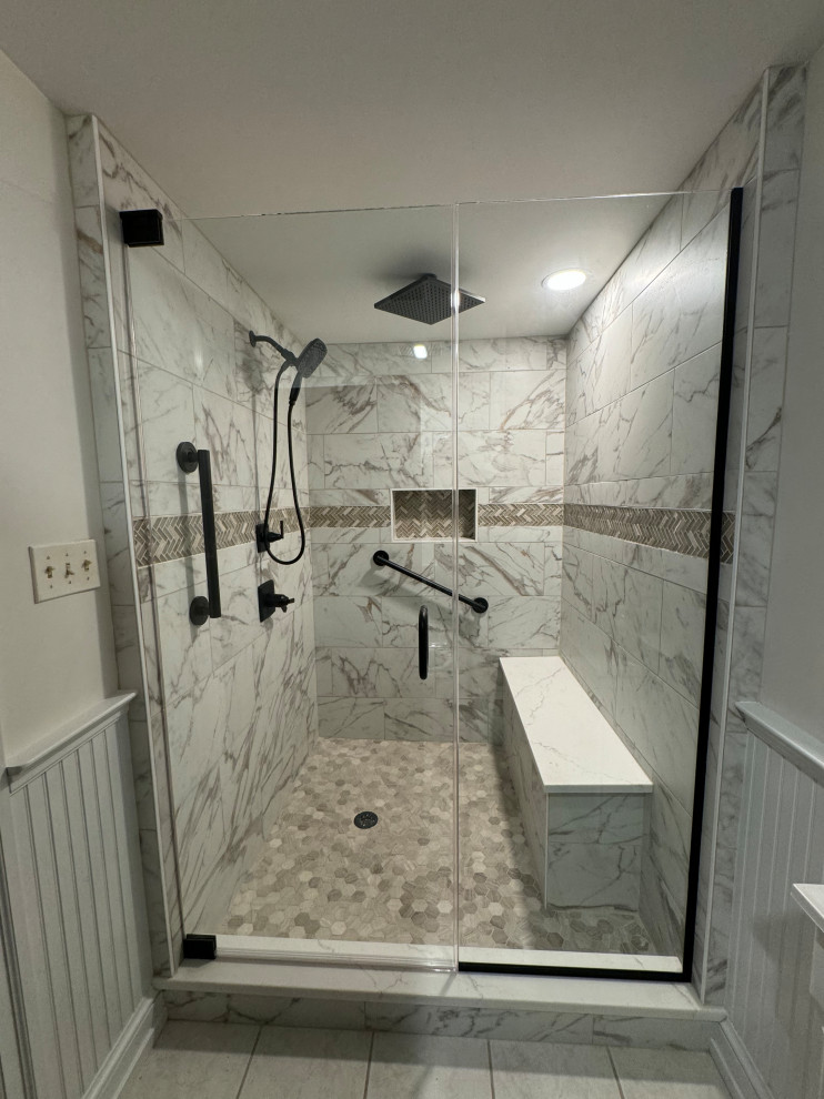 Walk-In Shower with Marble-Look Tile and Black Fixtures