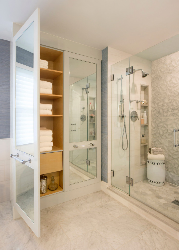 Photo of a large contemporary master bathroom in Philadelphia with blue cabinets, a freestanding tub, a double shower, gray tile, marble, blue walls, marble floors, an undermount sink, engineered quartz benchtops, grey floor, a hinged shower door, white benchtops, an enclosed toilet, a double vanity, a floating vanity and wallpaper.