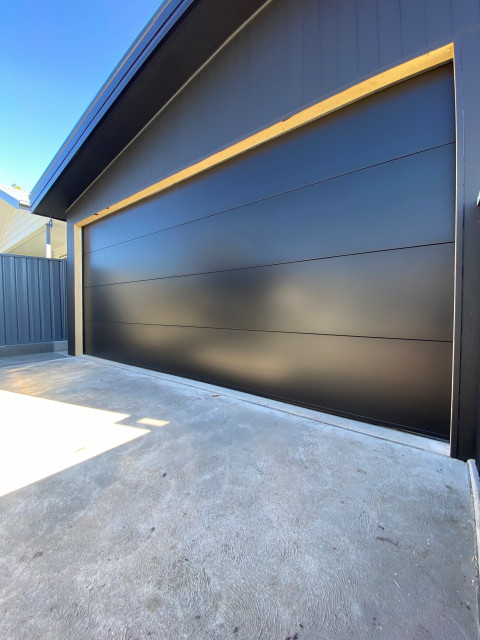 Matt Black Insulated Danmar Garage Door - Contemporary - Garage - Newcastle  - Maitland - by Macquarie Garage Doors