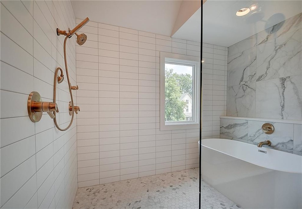 Country master wet room bathroom in Indianapolis with flat-panel cabinets, brown cabinets, a freestanding tub, white tile, ceramic tile, white walls, marble floors, a drop-in sink, white floor, a hinged shower door and white benchtops.