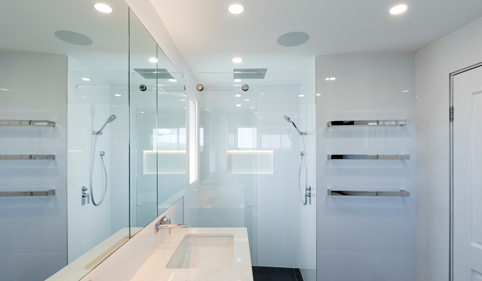 Photo of a large contemporary master bathroom in Sydney with beaded inset cabinets, white cabinets, a hot tub, an alcove shower, black and white tile, porcelain tile, engineered quartz benchtops, white benchtops, a double vanity, a floating vanity, white walls, ceramic floors, black floor and a niche.